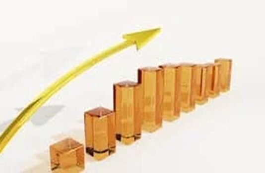 Gold bars, symbolizing an attract wealth mindset, are arranged in ascending order with a yellow upward arrow above them, denoting growth or increase.