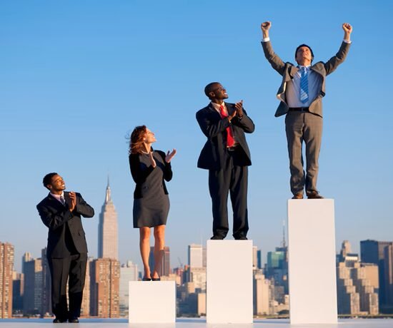 Top 8 Facts About John D. Rockefeller 1 Against a city skyline backdrop, four people in business attire stand on podiums, embodying wealth and power. One man raises his arms in victory, channeling the indomitable spirit of John D. Rockefeller.