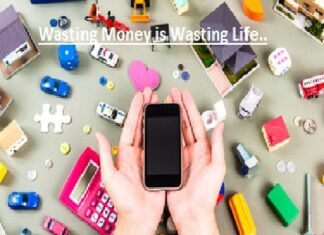 Hands holding a smartphone surrounded by toy houses, cars, tools, coins, and a calculator, with the text "Wasting Money is Wasting Life" above.