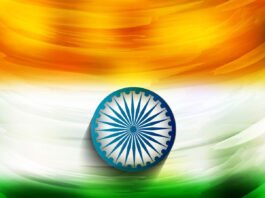 Abstract painting of the Indian flag with saffron, white, and green horizontal stripes and a blue Ashoka Chakra (sudarshan chakra) in the center.